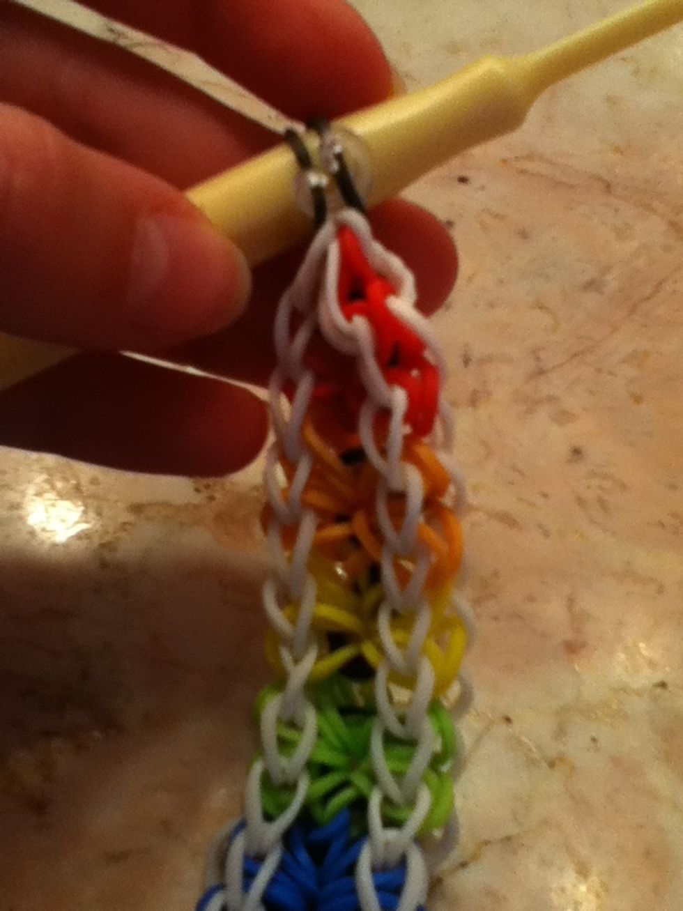 Put your c- clip on the black bands