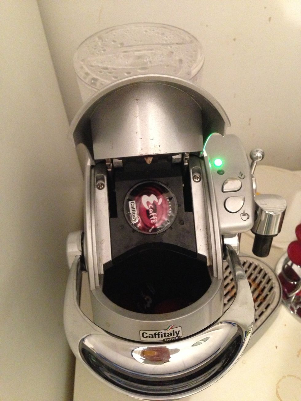 Put your capsule in its hole.