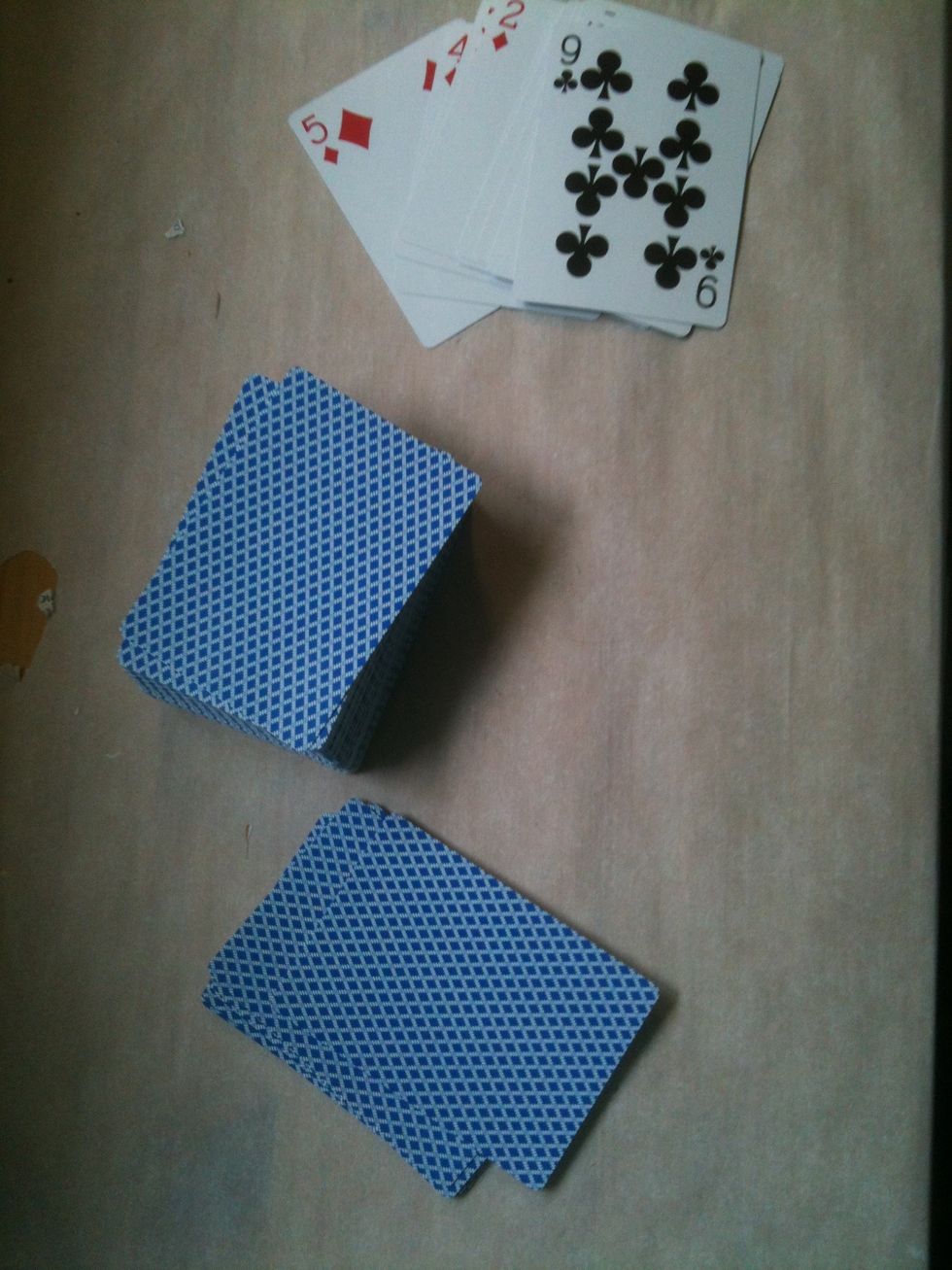 Put your cards together in 1 pile, then separate a pile of 9 and a pile of 8. These will be your lid and base.