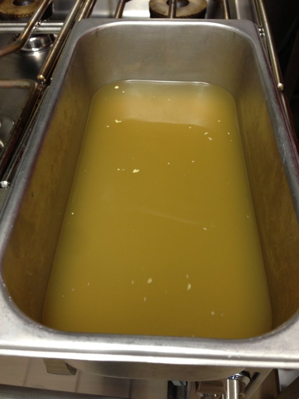 Put your chicken broth in a pan with a lid.