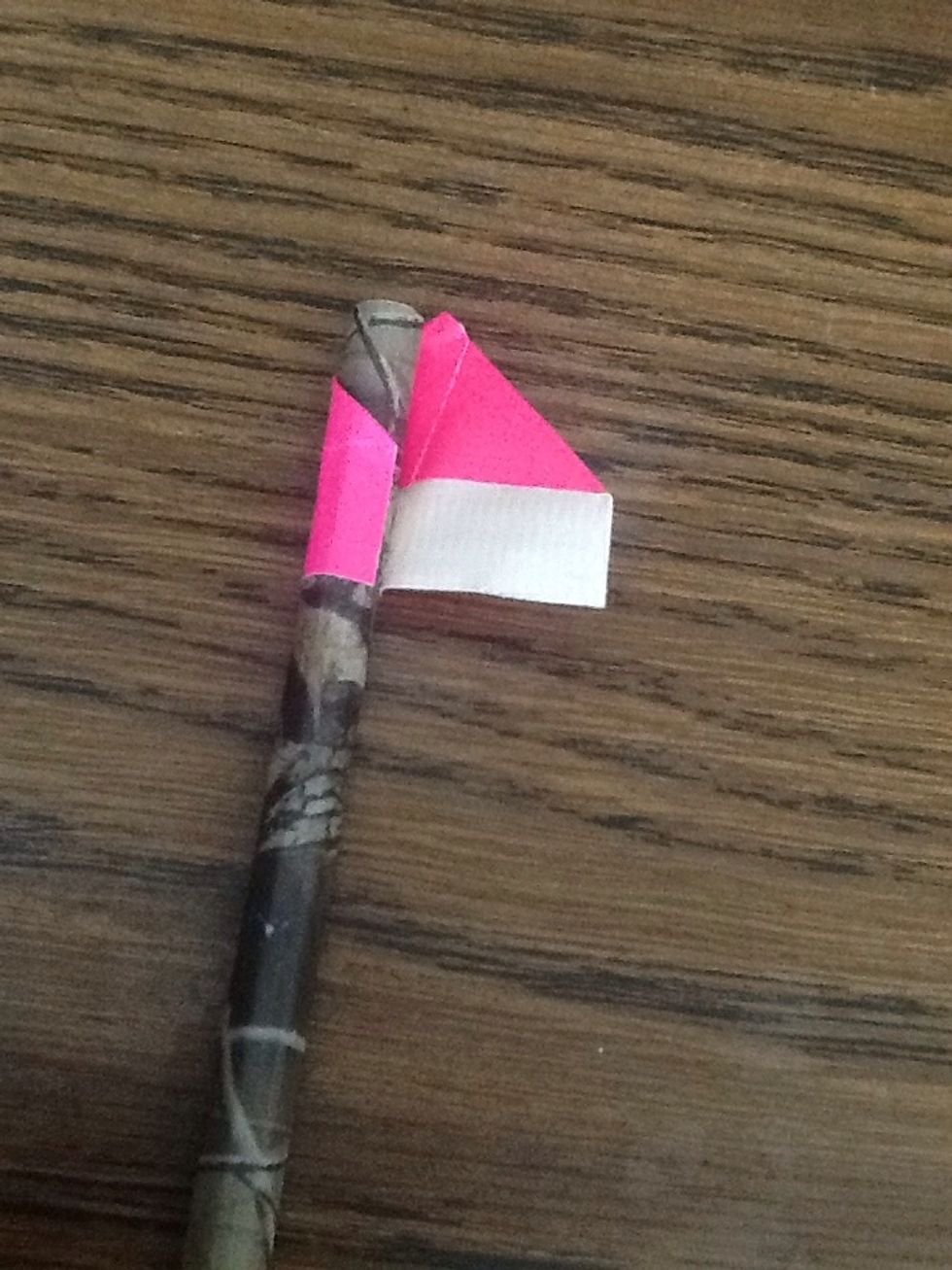 put your first piece of tape on the pencil. only show the tip above the eraser