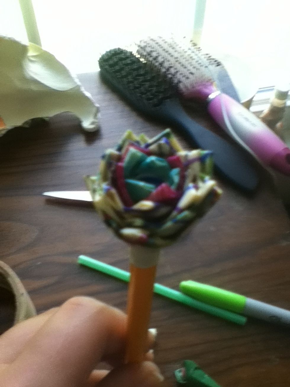 Put your flower back on your pencil unless its already on it