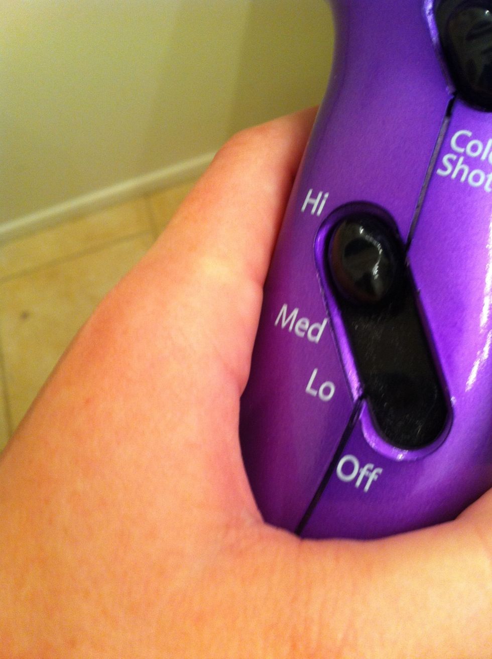 Put your hair dryer on 'high' and begin blowing on the crayon's tips( the side that is pointed DOWN towards the canvas) It will take a while for the wax to heat up so be patient!!!