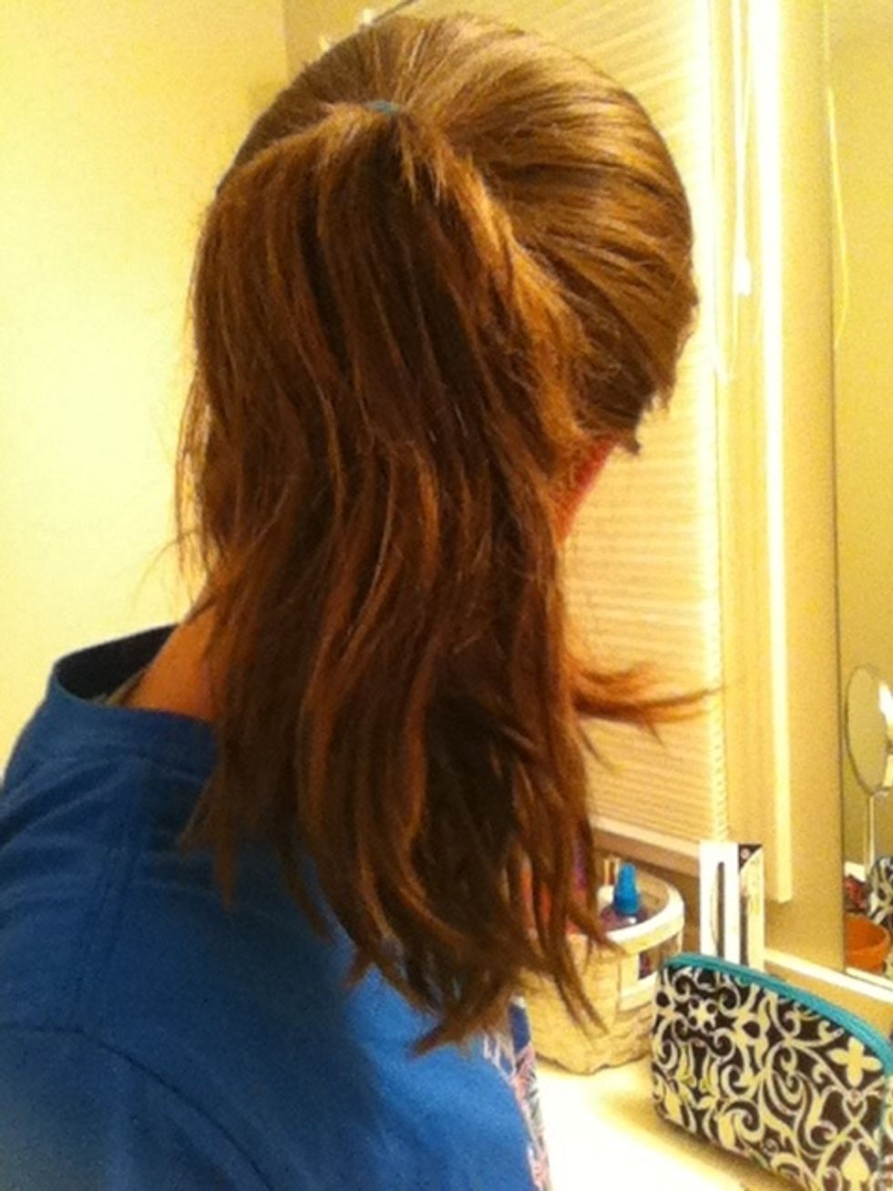 Put your hair in a loose ponytail