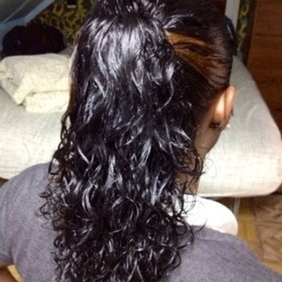 Put your hair in a ponytail. How high you make your ponytail that's how high the bun will be.