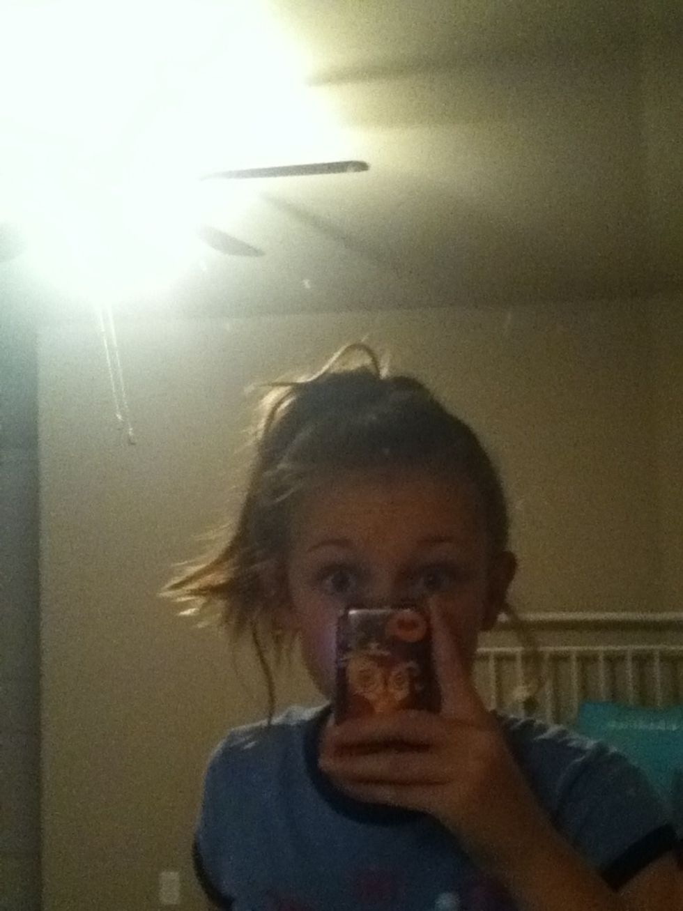 Put your hair into a ponytail (high or low, it depends on your preference)