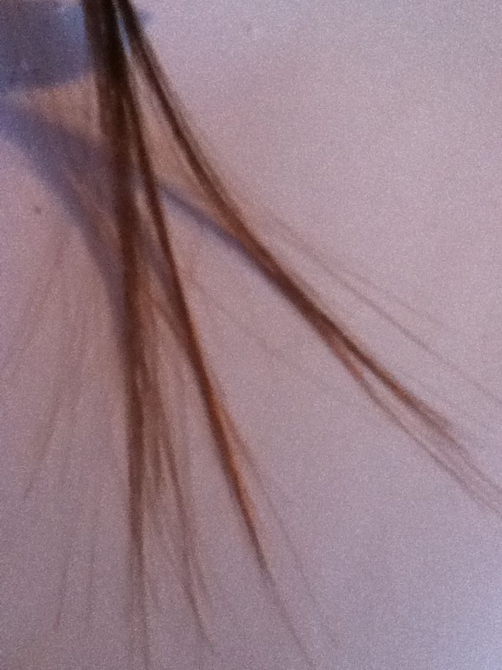 Put your hair that you want to dye on the piece of paper