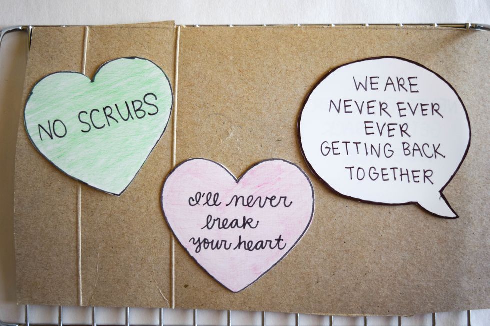 Put your hearts on medium cardboard or parchment paper and into a toaster oven at 325\u00b0F for 1-2 minutes.
