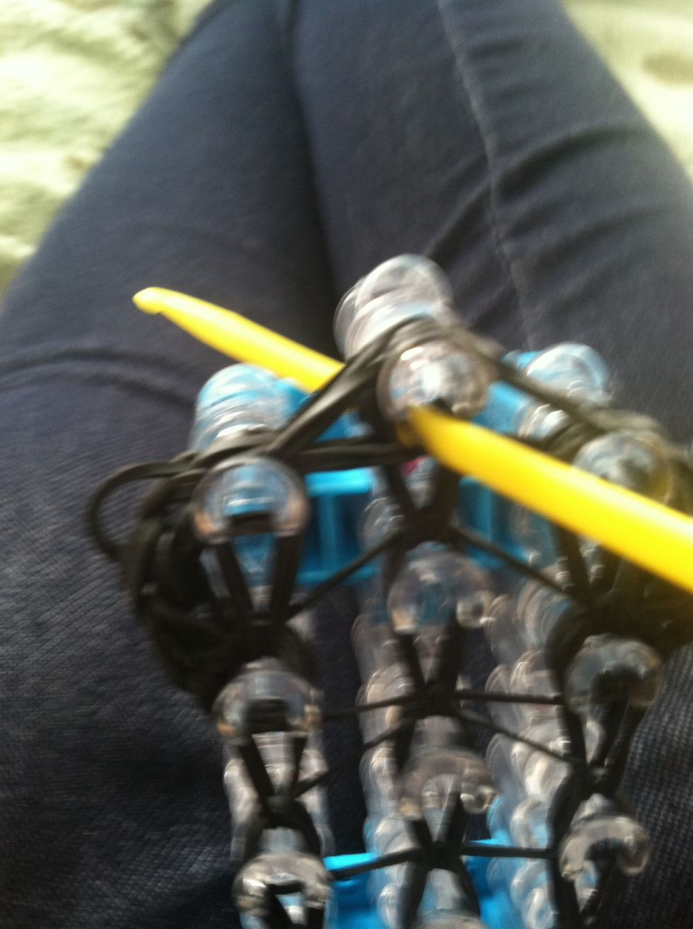 Put your hook though the top of allllllll the bands.