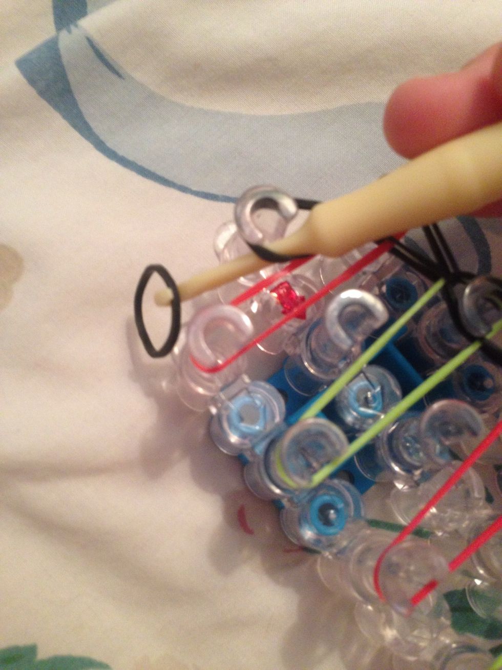 Put your hook through the end, and grab a band