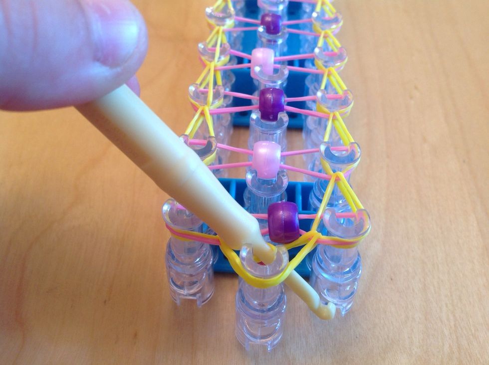 Put your hook through the gap.