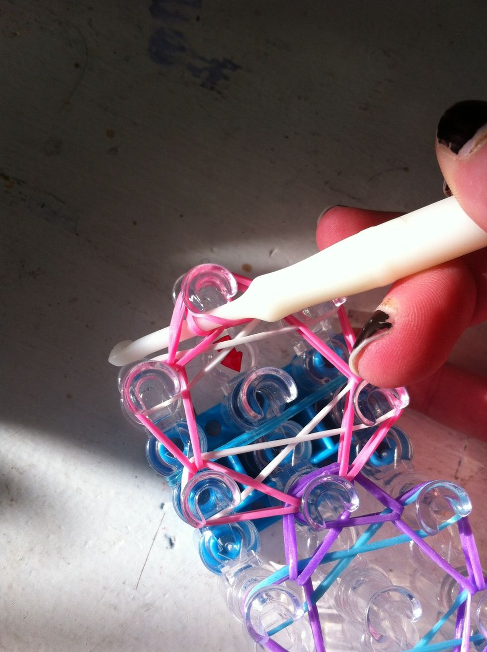 Put your hook through the top peg