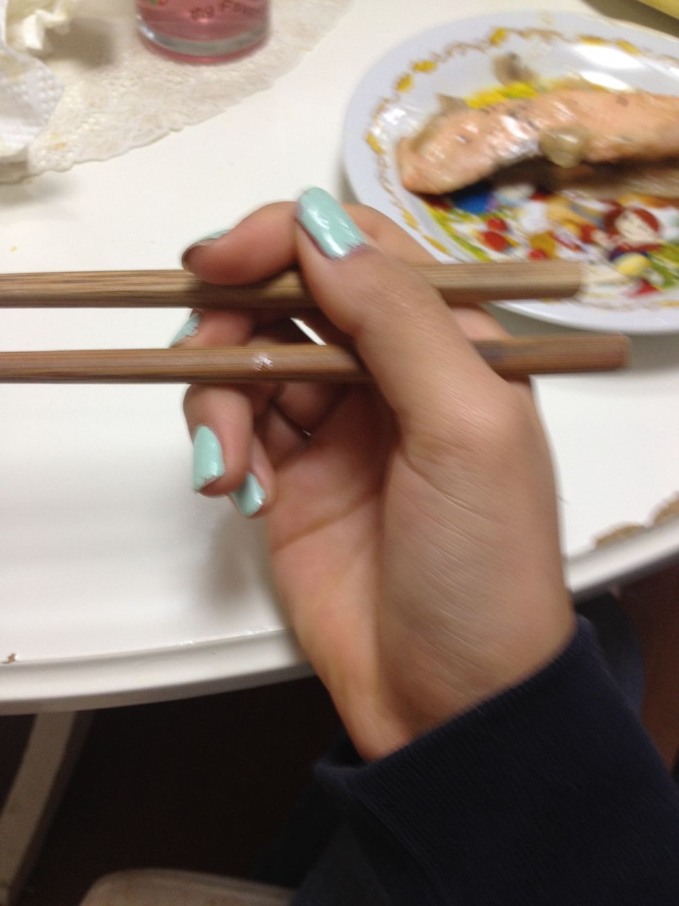 Put your middle finger between them, that will allow you to move it up and down