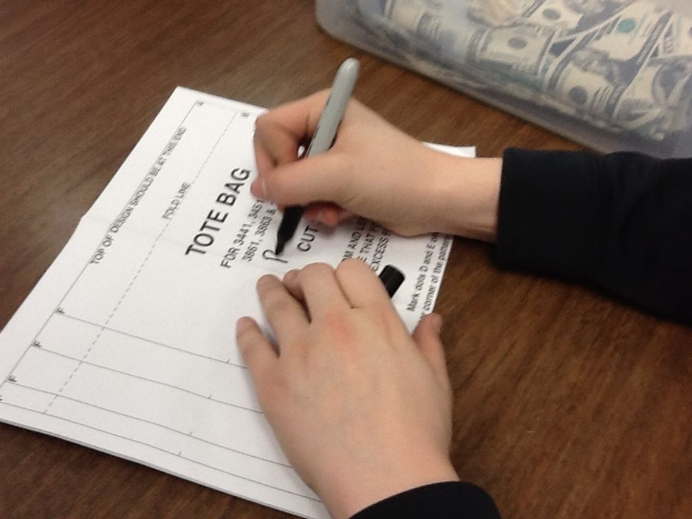 Put your name in the middle of the tote bag sheet.