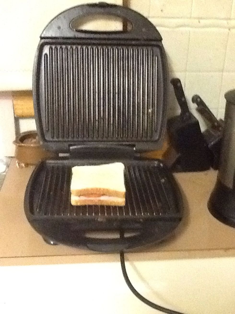 Put your non-toasted sandwich onto the brevill. If you don't have a brevill you can also cook it under the griller.