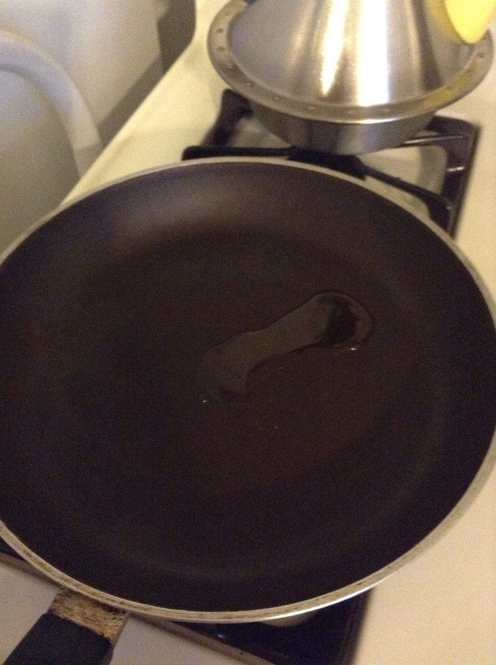 Put your oil in the skillet and put the heat on medium.
