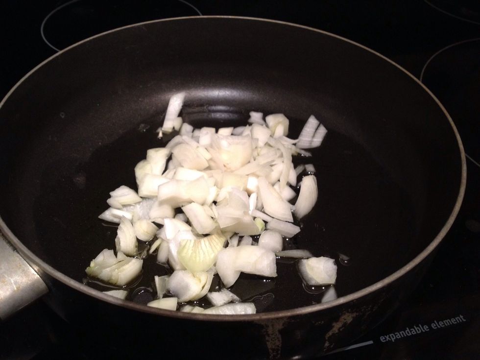 Put your oil (or butter) into a skillet with a pinch of salt and saute the onions until they start to turn slightly brown (about 4 minutes on medium heat).