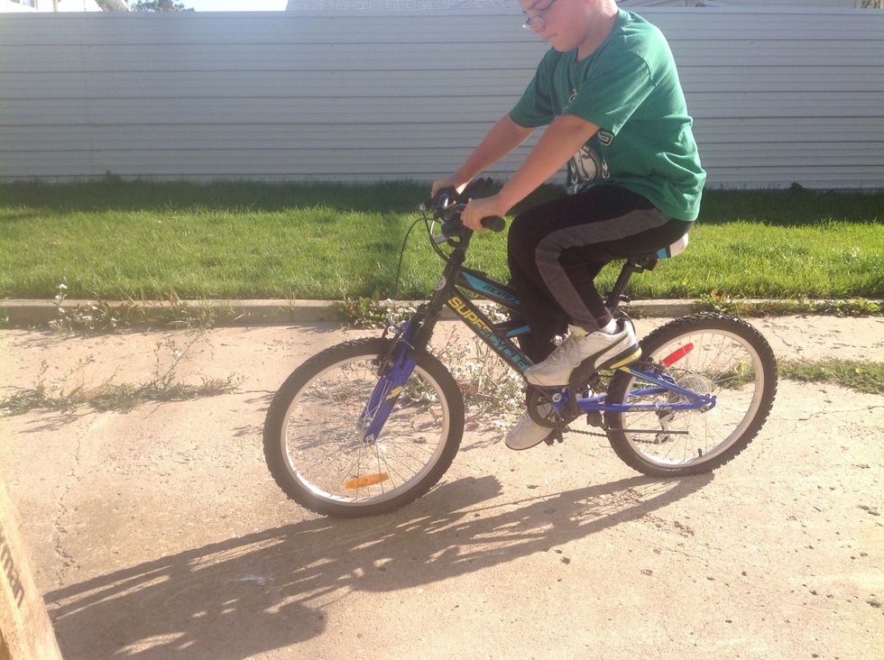 Put your other foot on pedal and pedal with both feet.