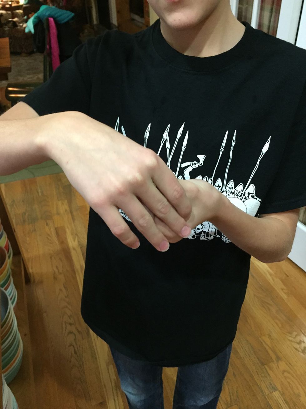 Put your other hand in front of the coin and at like your taking it.