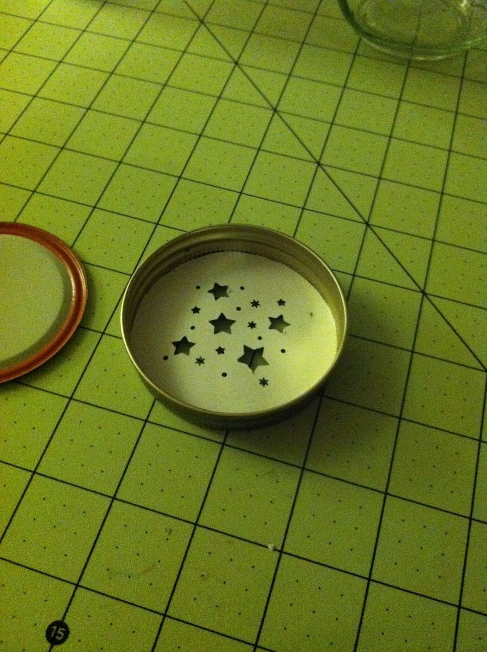 Put your paper circle into the outer ring and reassemble the lid.