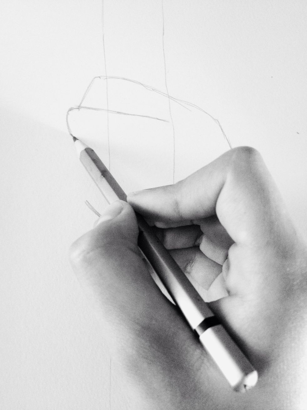 Put your pencil on the middle finger knuckle line.