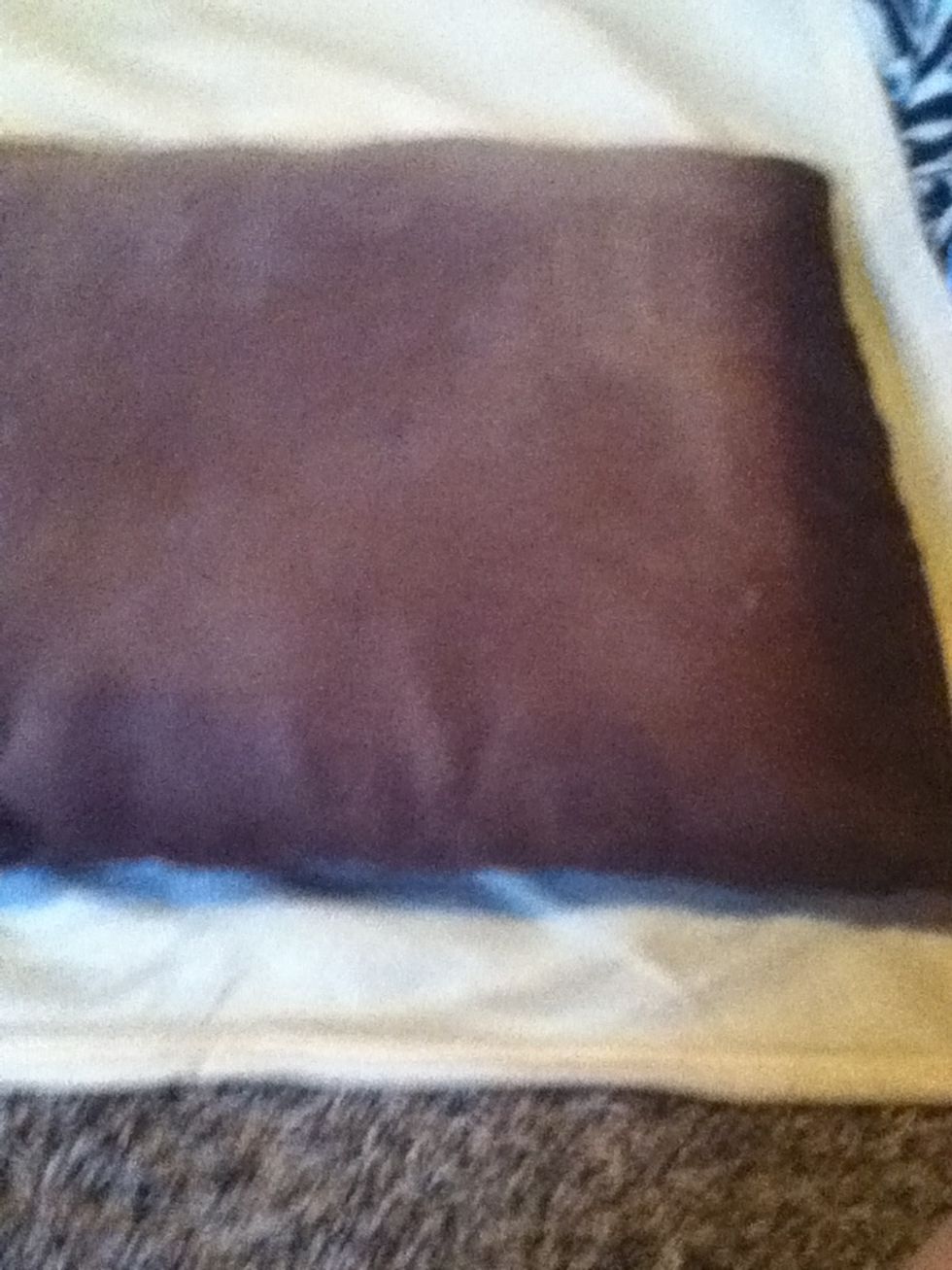 Put your pillow that you are making the case for on one of the blankets