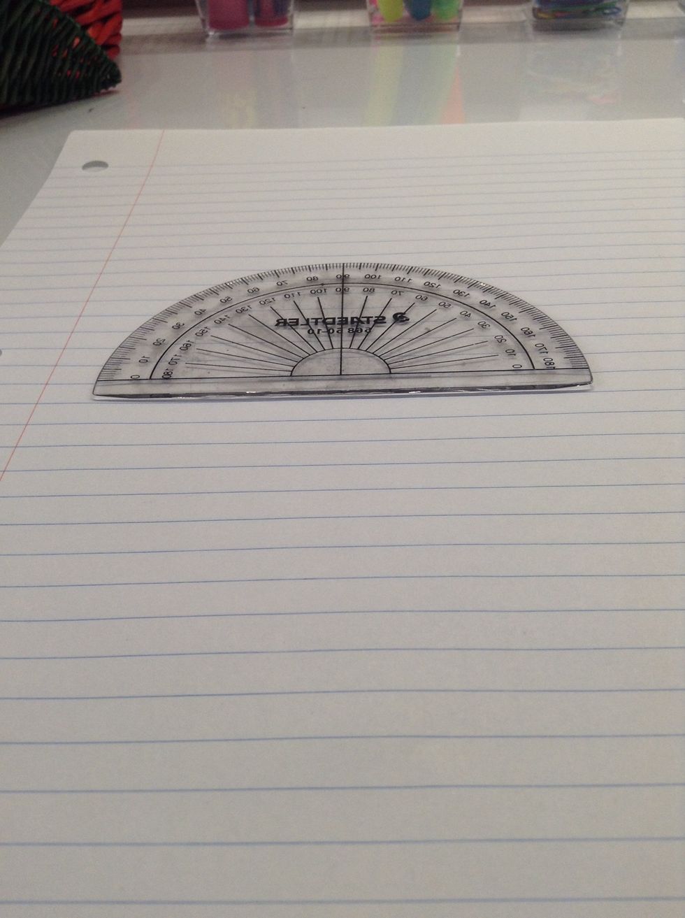 Put your protractor on the line that you drew in step 1.