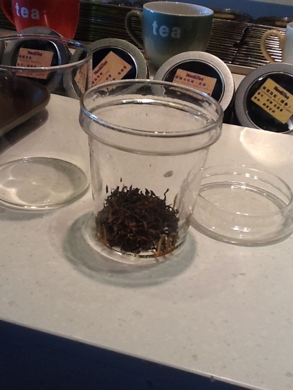 Put your Puer tea in the glass (container with leak holes)