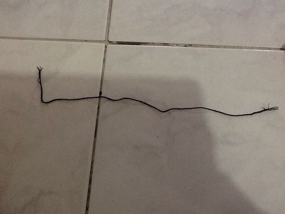 Put your string through the rings and tie at the ends of the last rings ,