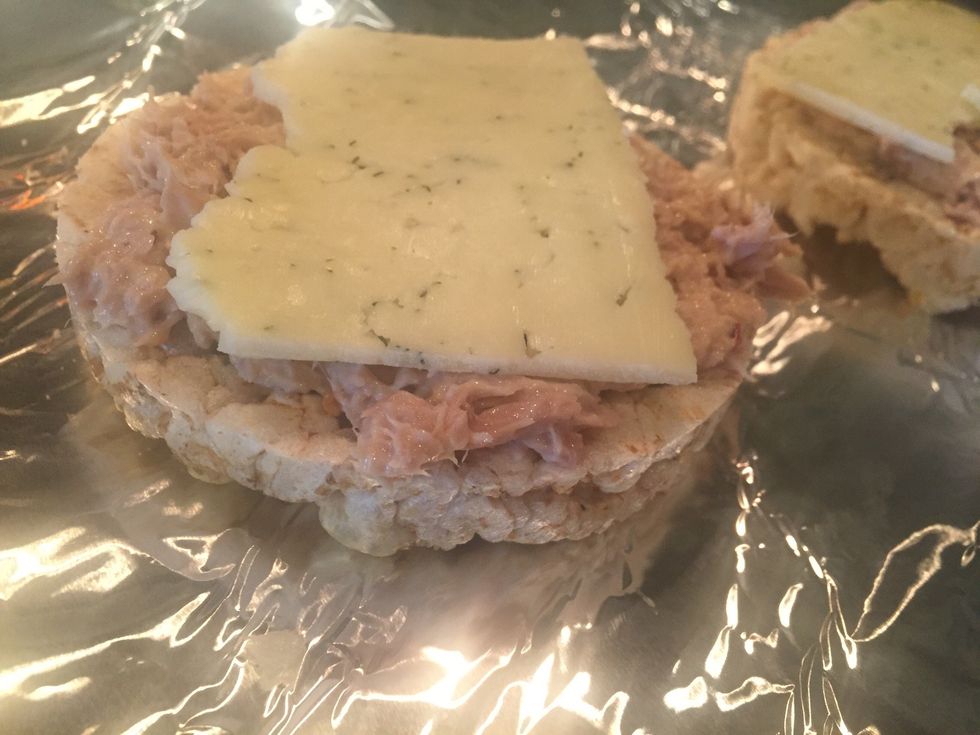 Put your tuna on a plain rice cake, and top with dill havarti cheese. I always put dried dill in the tuna, but didn't have so I did this instead. I still prefer dill inside the actual tuna mixture.\ud83c\udf3f
