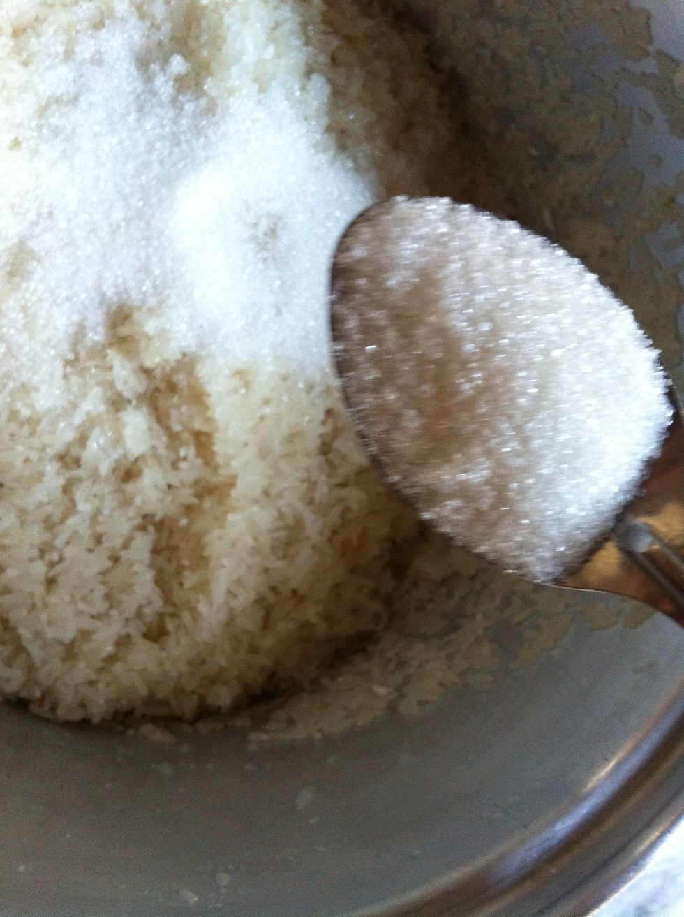 Putting sugar 2 table spoon