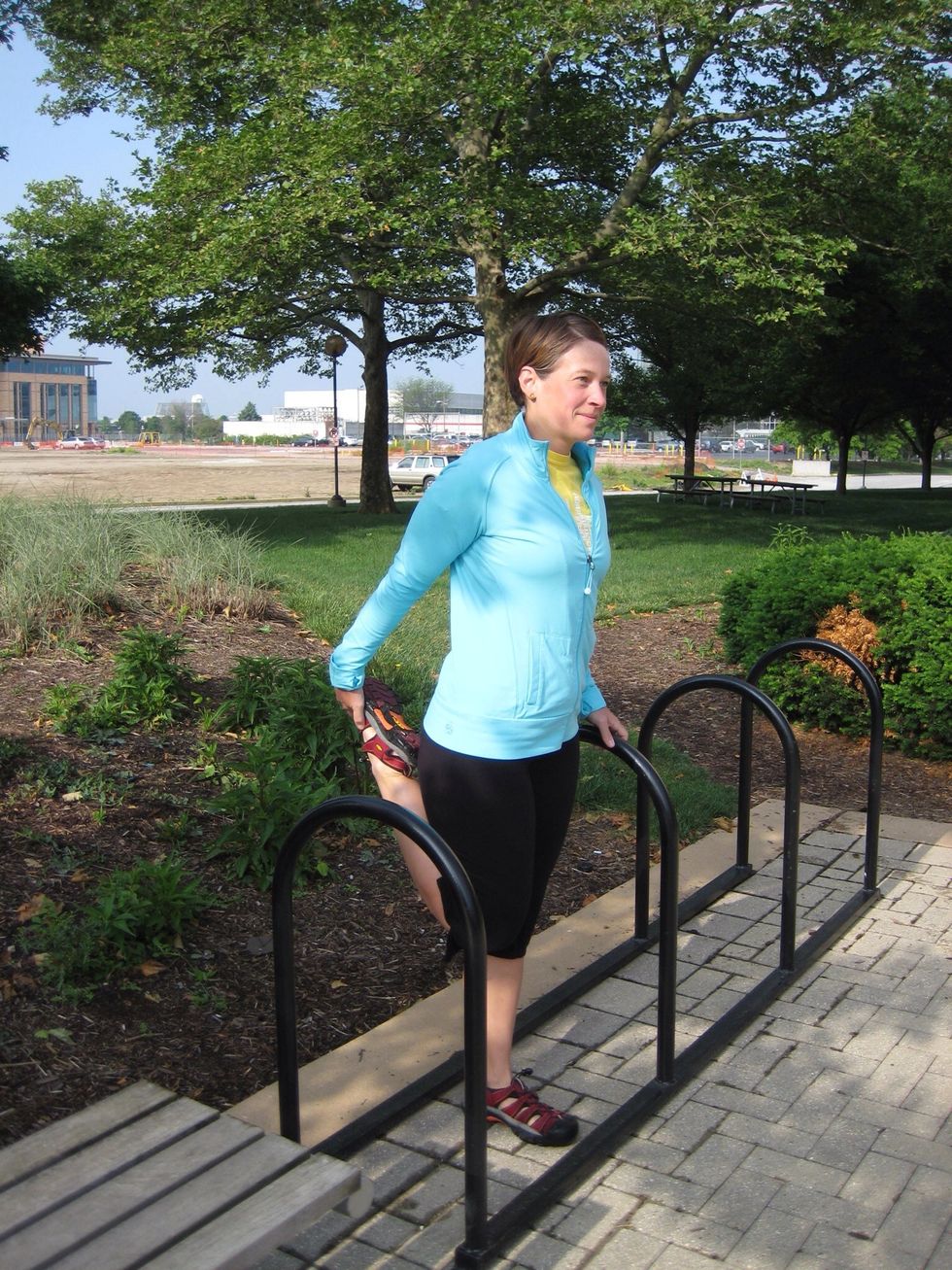 Quad stretch \u2013 Knees together, pull one leg up behind you and hold onto foot