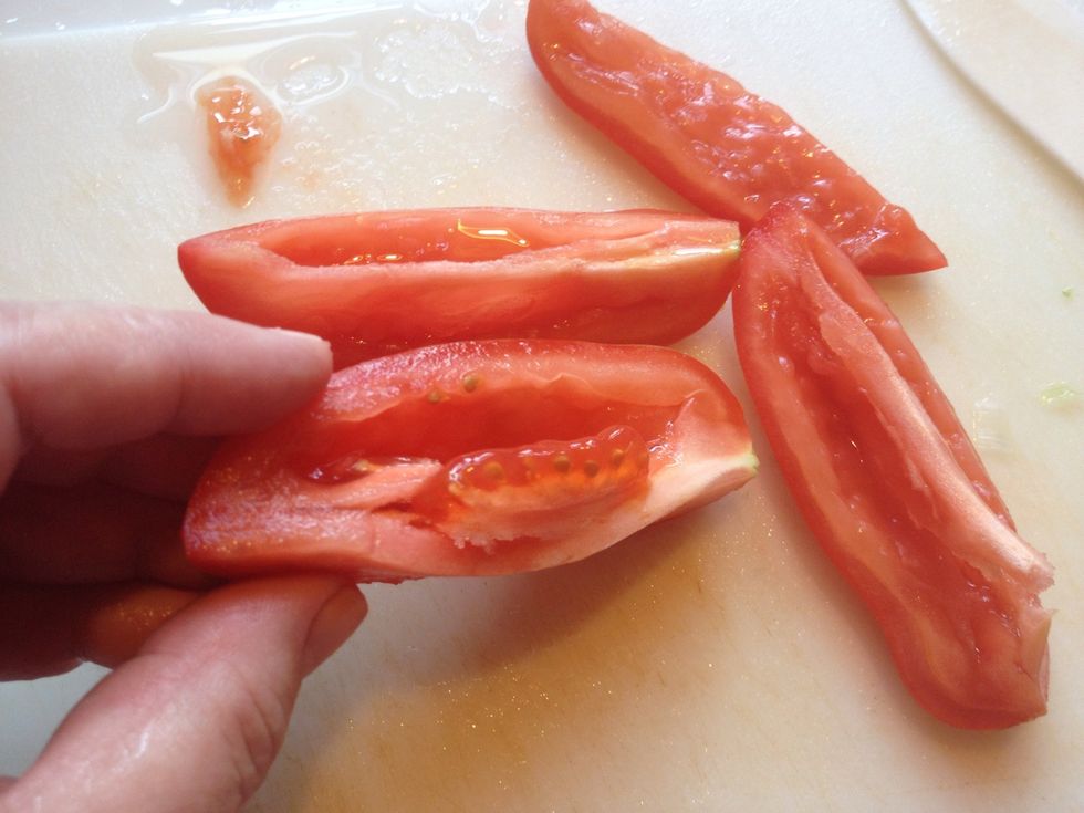 Quarter the Roma tomatoes and remove the seeds. I buy four tomatoes because if the flesh is thin you will need all four. If the flesh is thick you might only need two. These are thin.