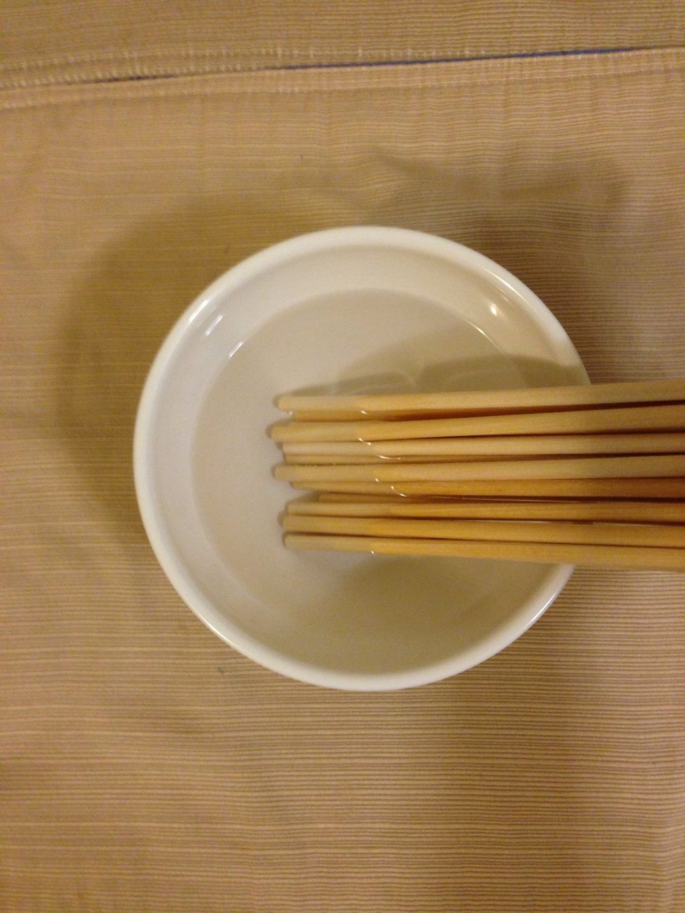 Quick Trick!   Soak one end of your dowels in water for about 5 min to help soften the wood. Pat dry. This makes it easier for you to push your pin into the dowel and also avoids splitting the wood.
