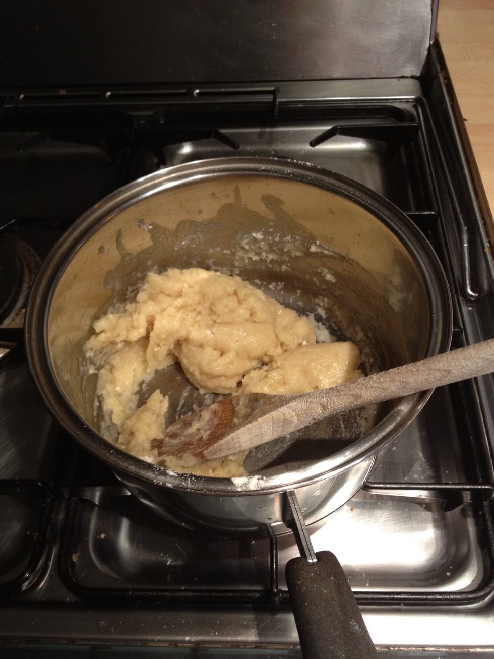 Quickly add all the flour to the hot liquid and beat until combined, return to the heat.