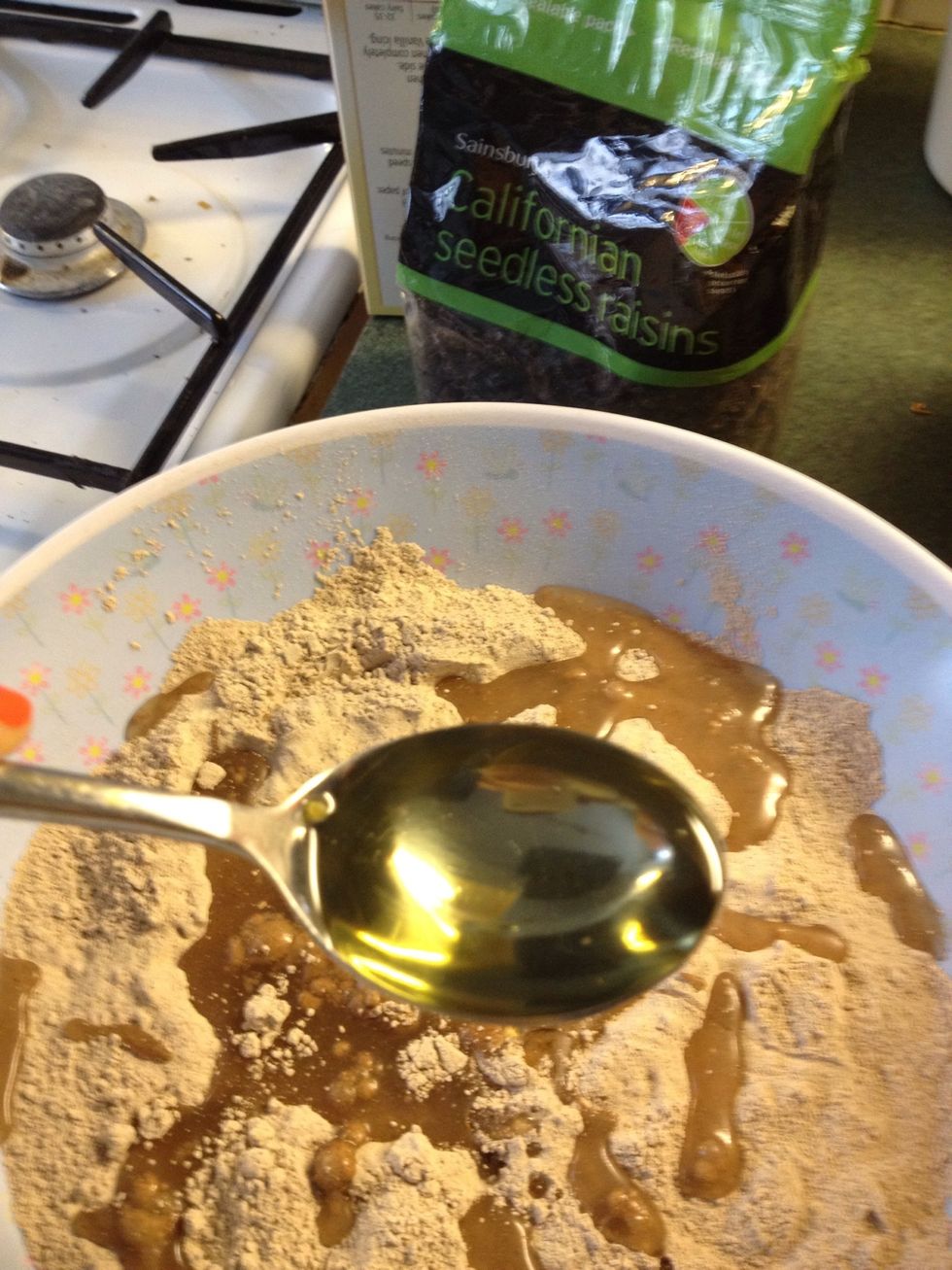 Quickly add in the oil, stir the mixture together. Do not beat or blend. And do not over stir. It should be lumpy, that what makes it sticky and yum!