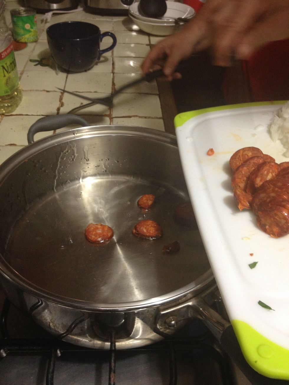 Quickly fry the chorizo and take it out before it turns brown.