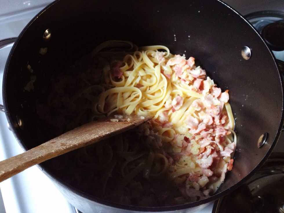 Quickly mix in the sauce while the pasta is still hot.