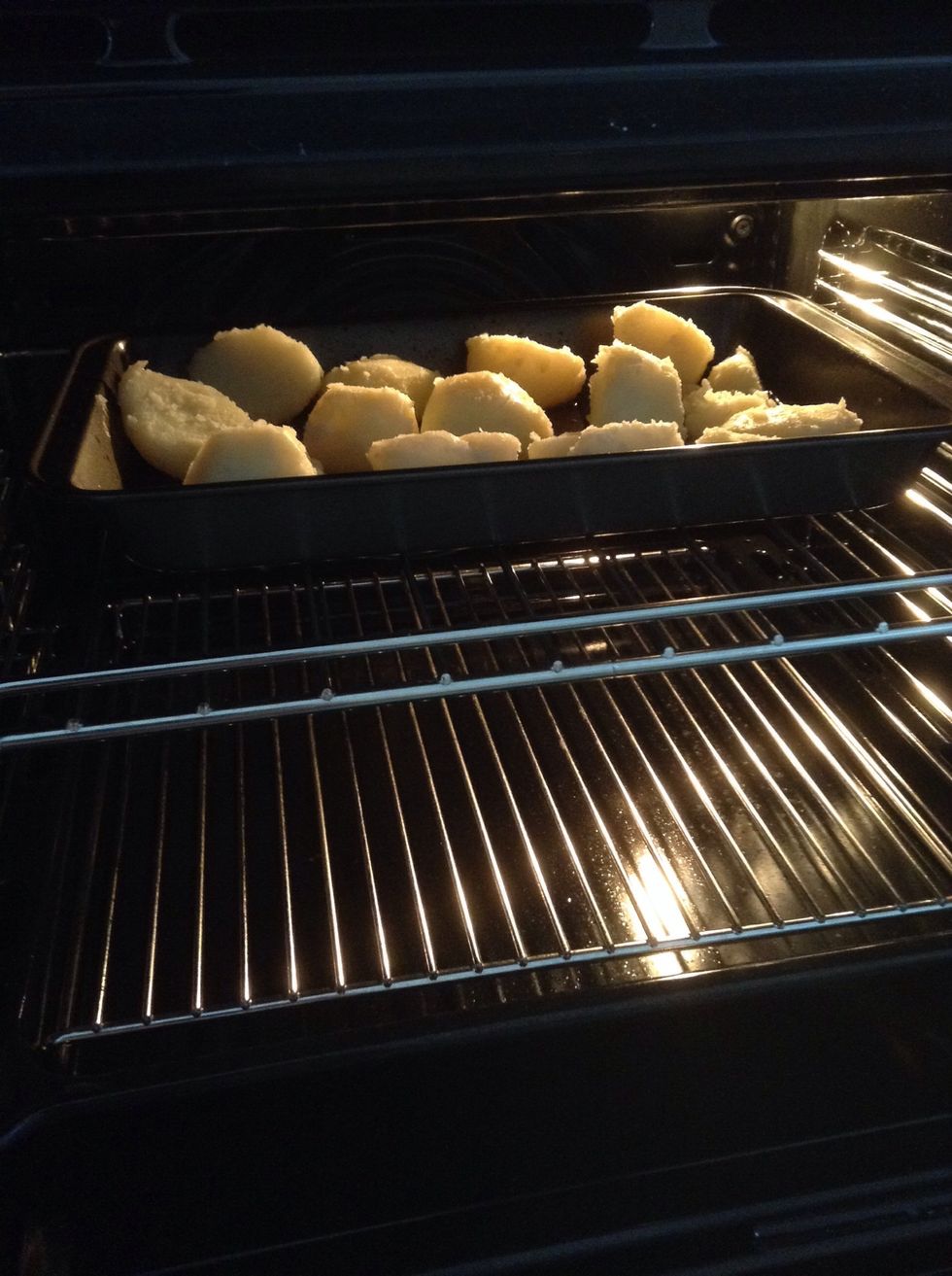 Quickly put the potatoes back in the oven, still at fan 180 and leave to cook for ten minutes before checking on them.