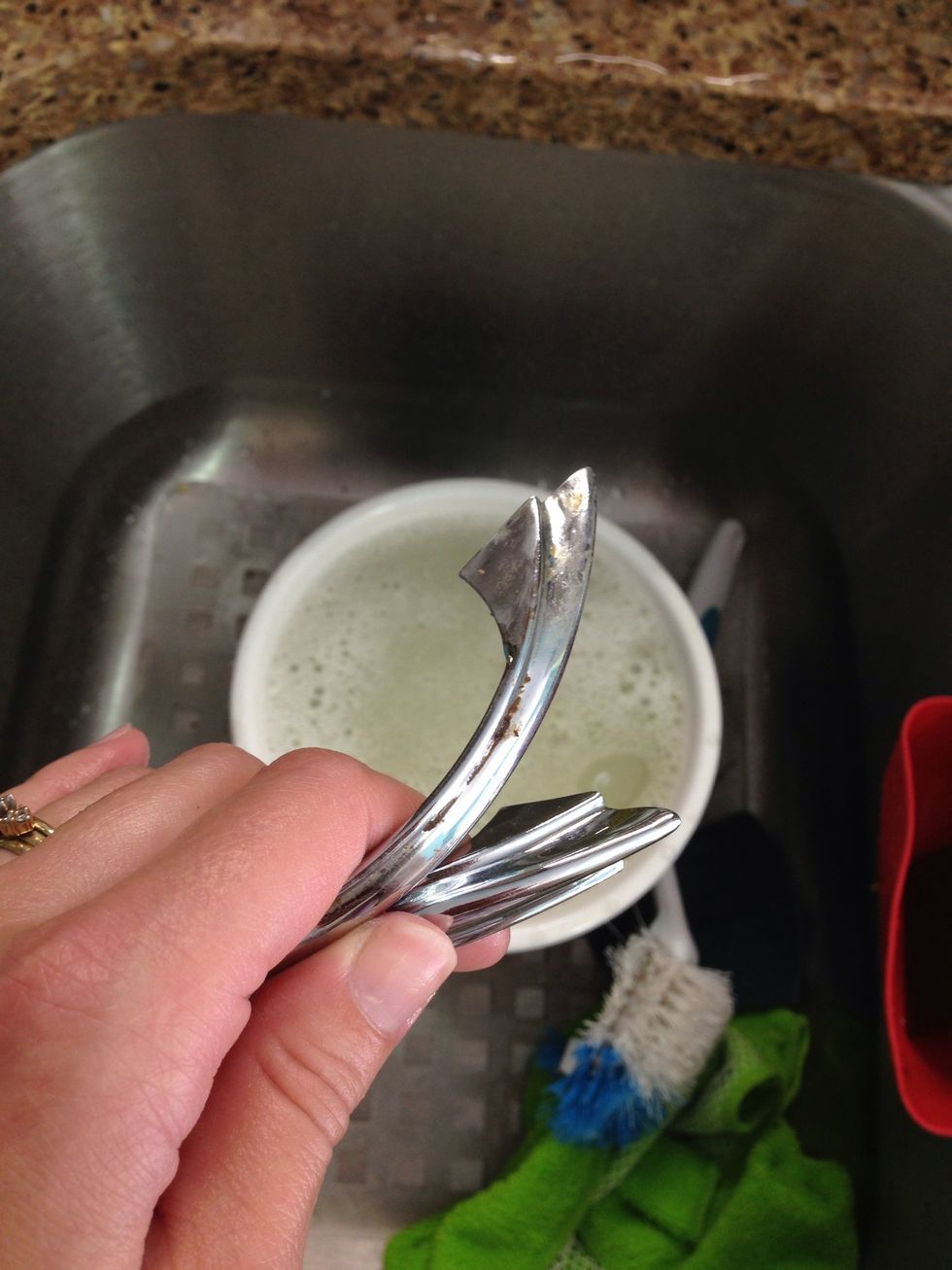 Quite a bit of the grime chunks boiled off, but the stuff still on them is soft and easily removed with an old toothbrush.