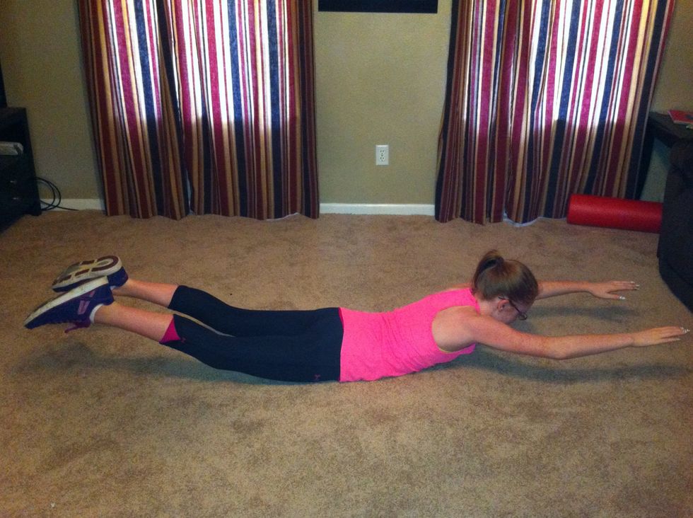 Raise both arms and both legs. Hold for 3 counts.