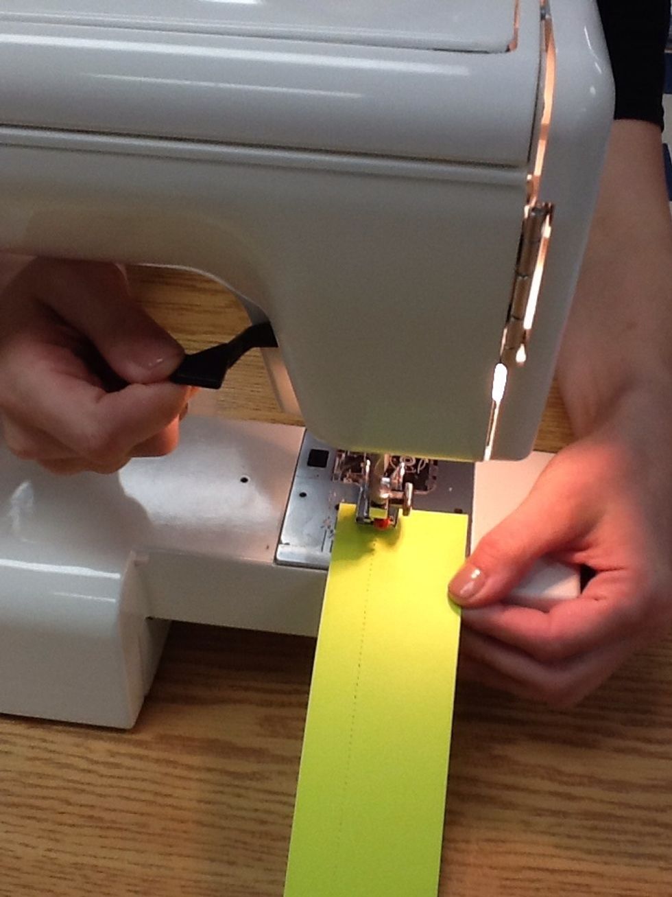 Raise the Pressor Foot Lifter gently