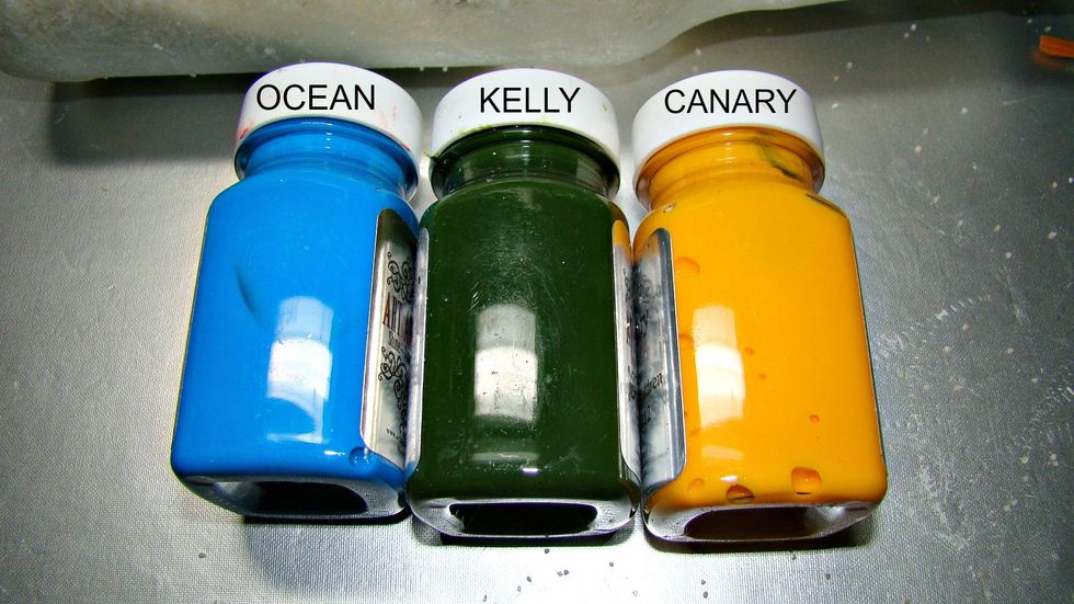 Randomly start adding your Shine Dimensional paints to your glass bottle. I used a sponge to give more texture. Allow to dry.