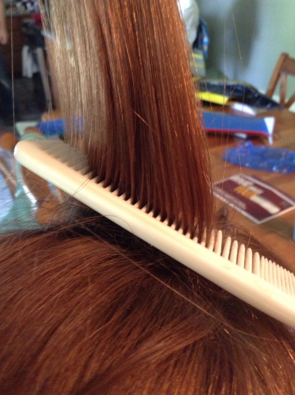 Rat hair at the crown of your head to give it a little volume