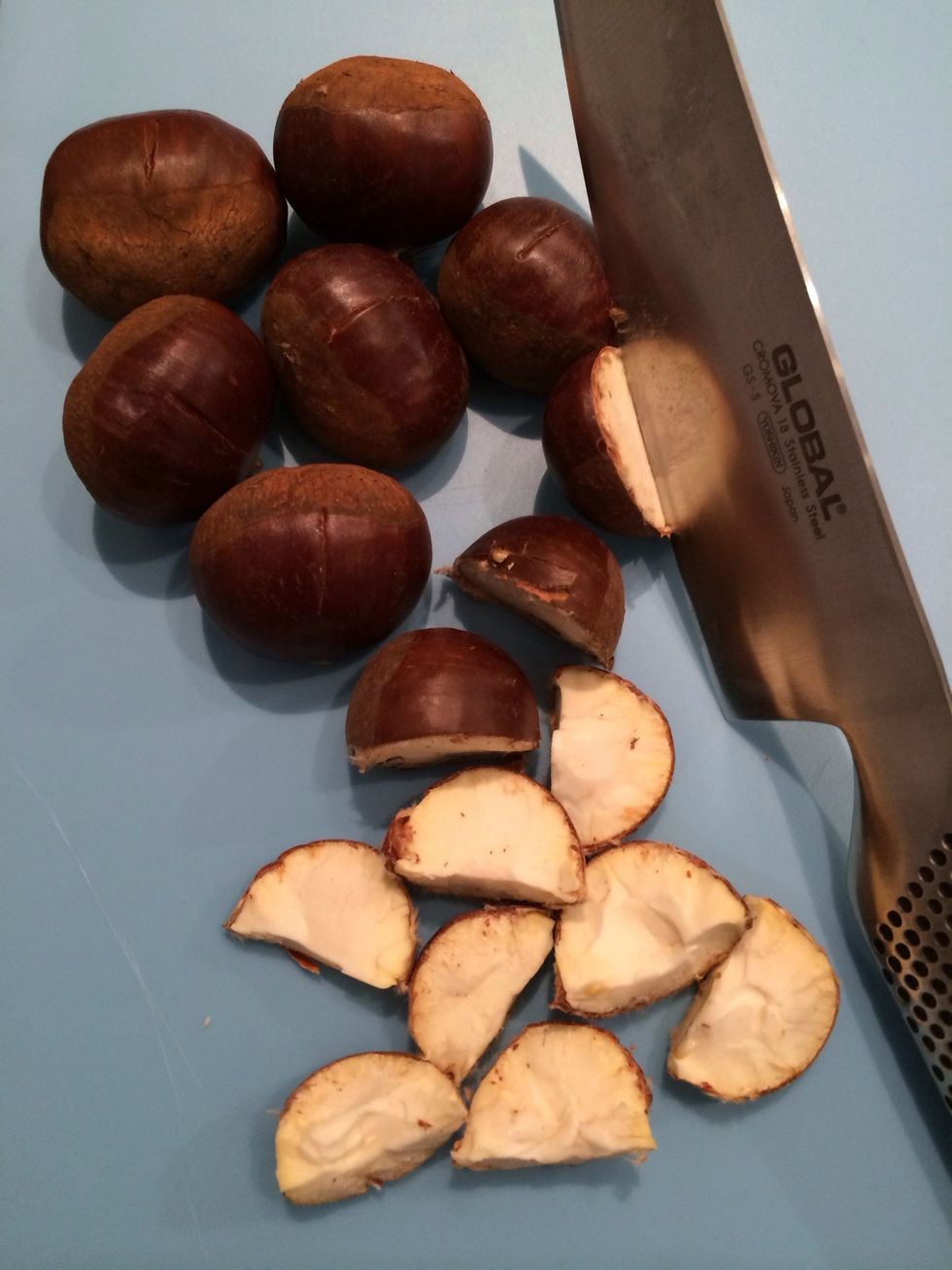 Raw chestnuts...In the microwave . cut into quarters. Put in the microwave 1 min on high. Repeat once. Let them cool down. The skin will come out.