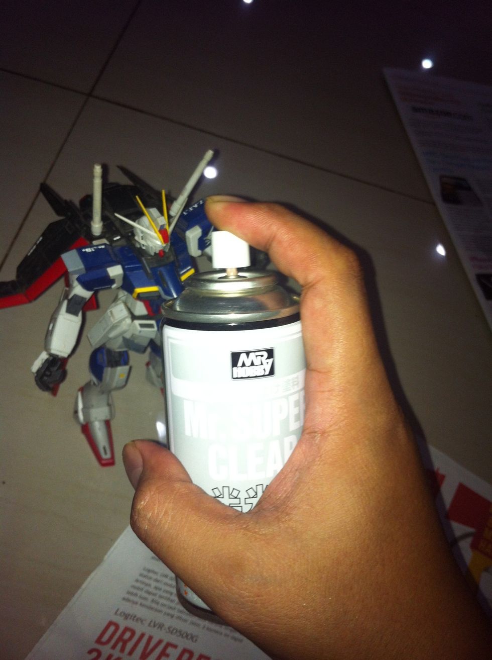 Re-assembly your gunpla when the paint is dry enough. And put a glossy paint to furnish it. Pasang lagi gunpla setelah cat kering. Lalu cat lg pake cat glossy.