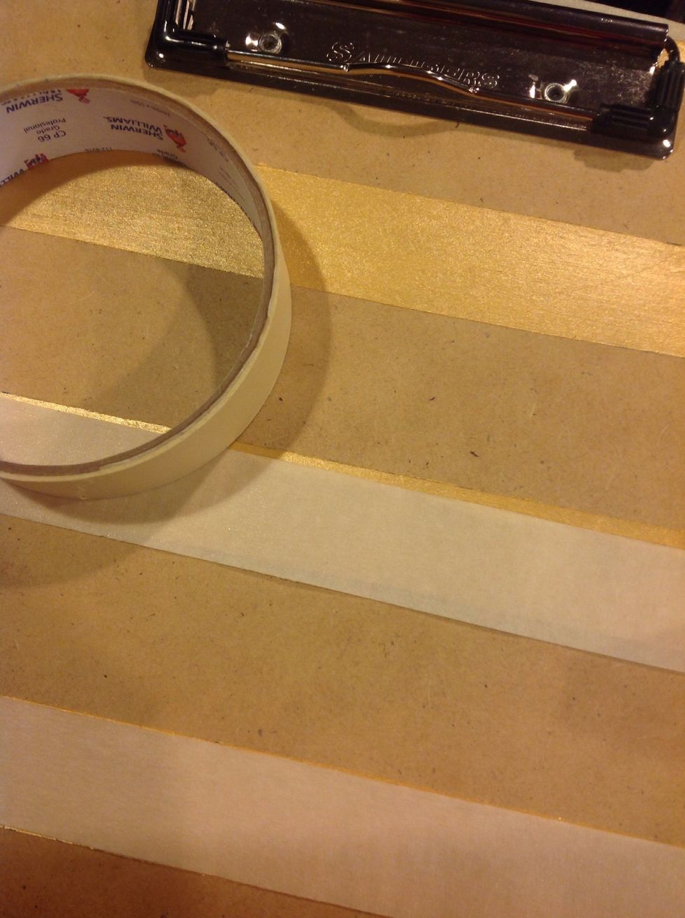 Re-tape over your first set of stripes once painted and dried completely