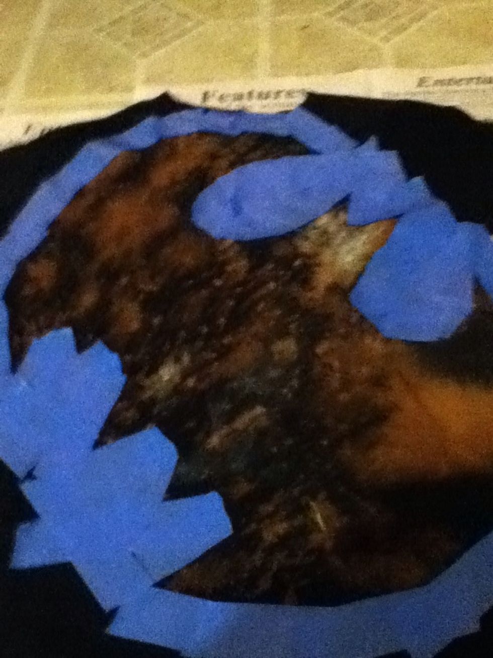 Re-tape the design and lightly add a layer of white with your sponge brush DON'T MAKE IT THICK very light