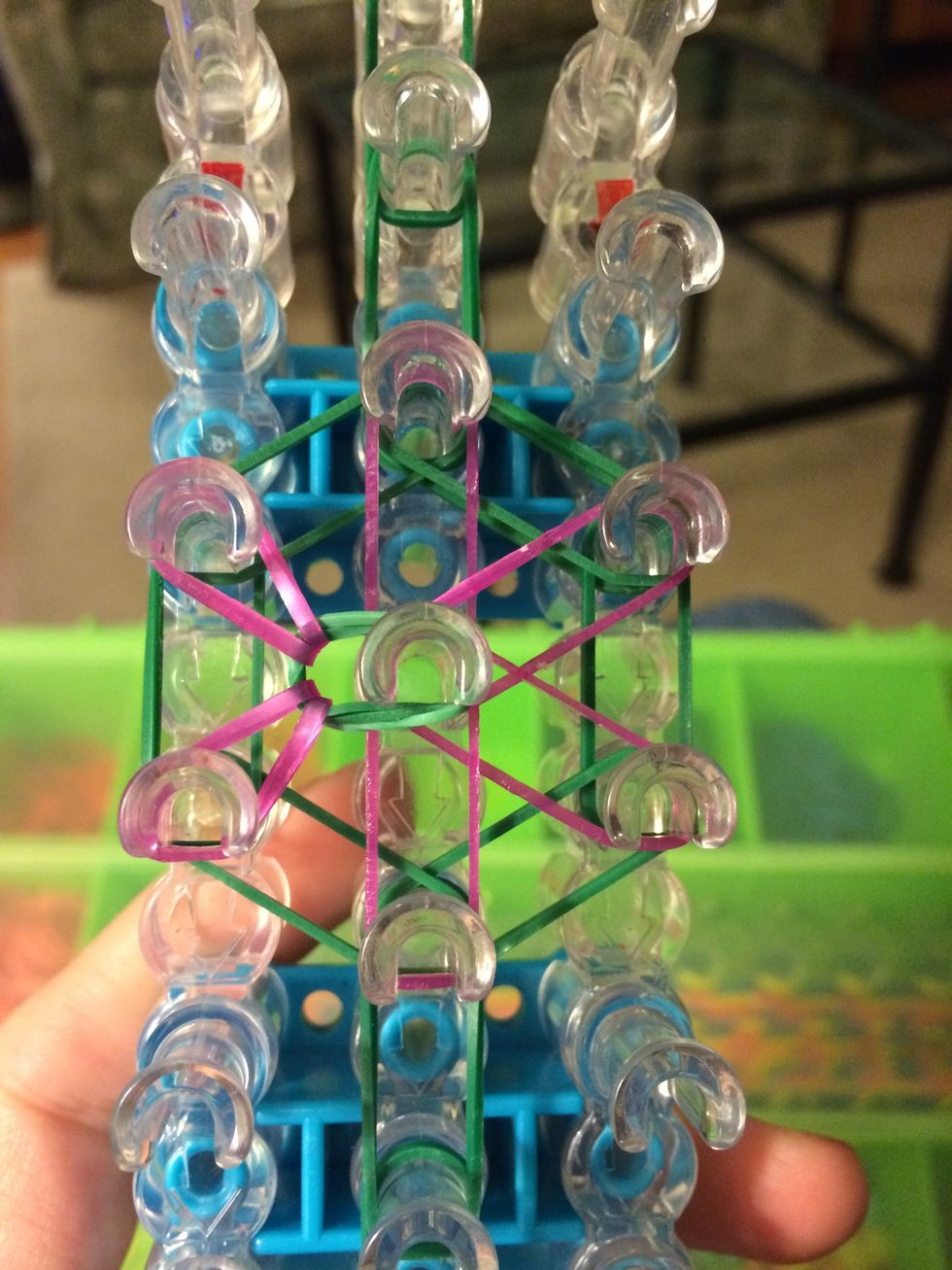 Reach back into the center and grab the next one on top.