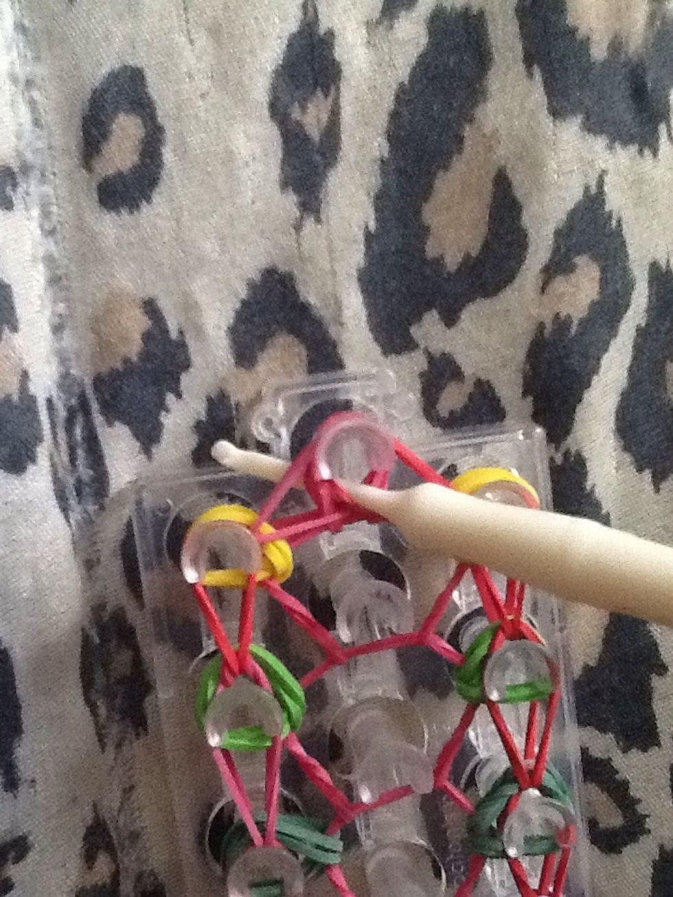 reach in under all the bands on the last peg